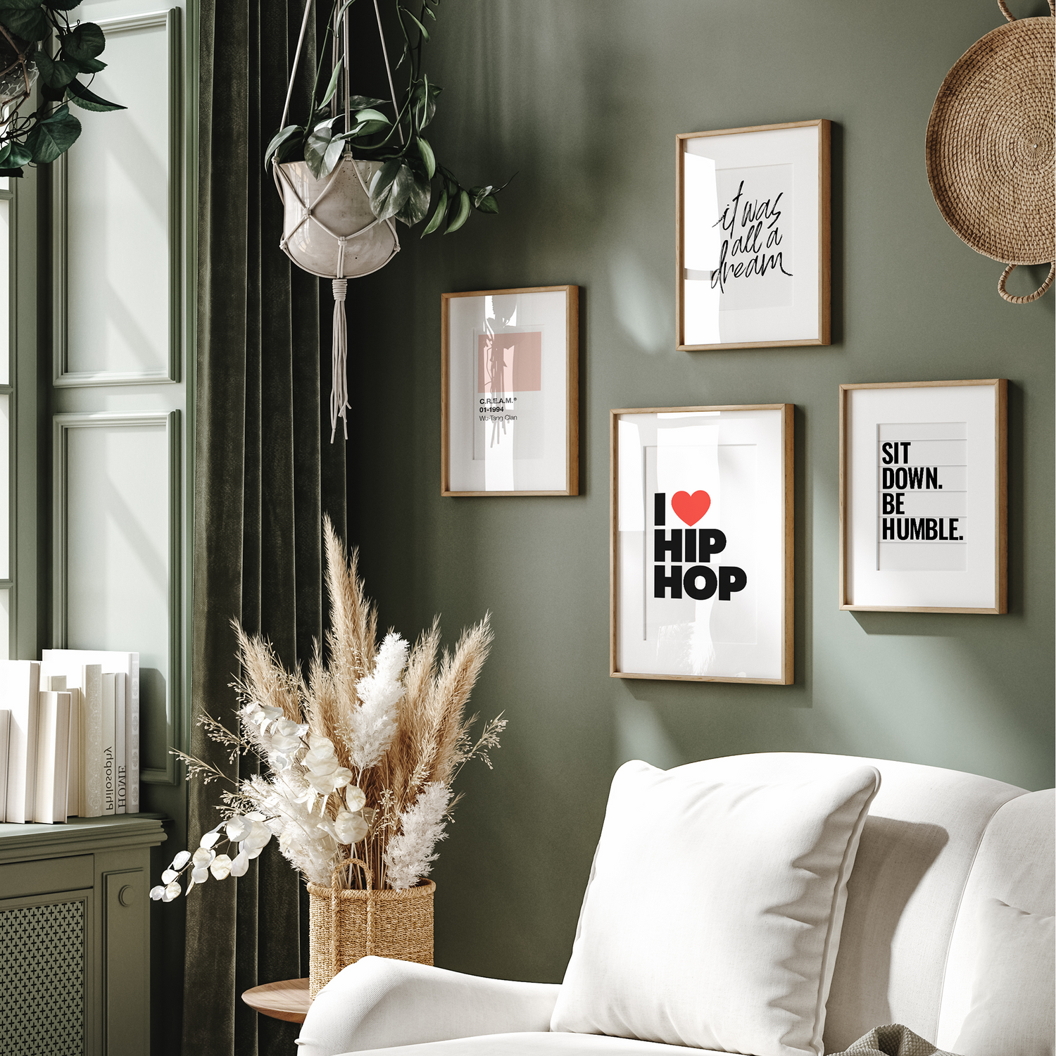 Set of posters inspired by 90's hip hop hanging on green bedroom wall