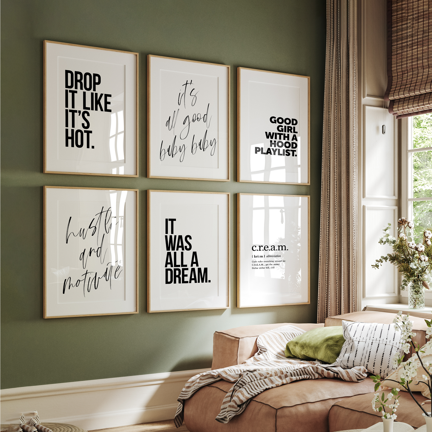 A series of hip hop-themed typographic posters hanging on a green living room wall